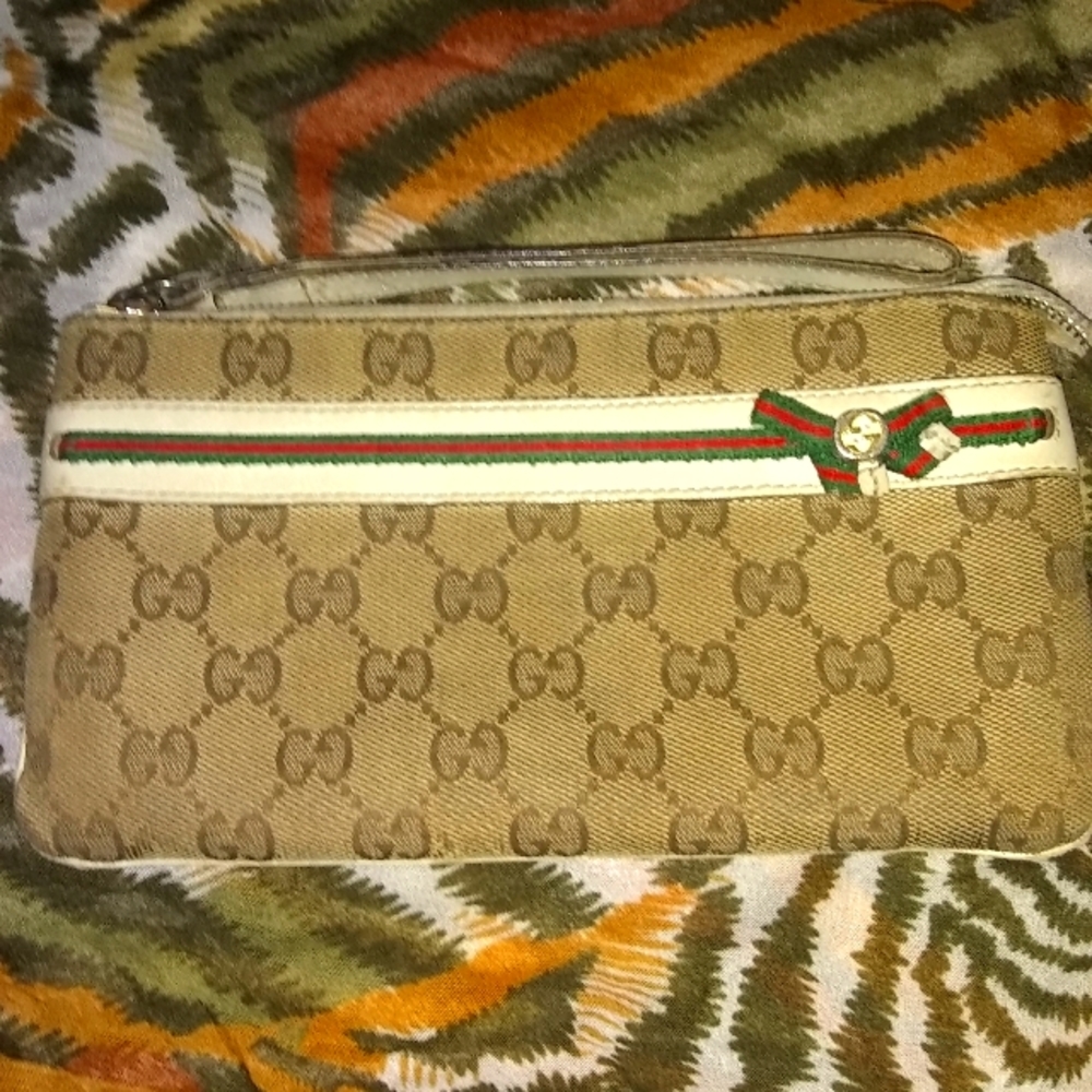 AUTHENTIC GUCCI SOHO GUCCISSIMA CLUTCH/WRISTLET  (RARE FIND) 🦋